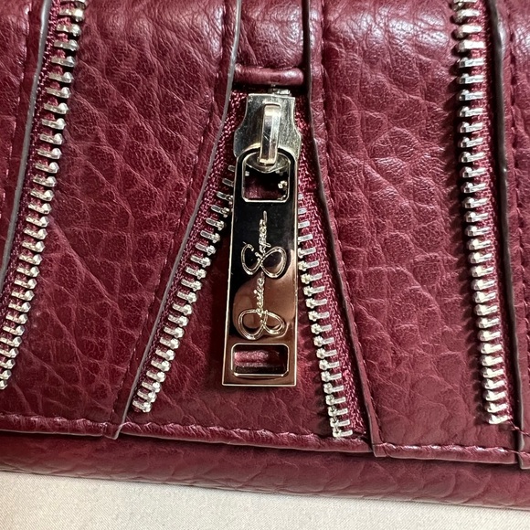 Jessica Simpson Chic Burgundy Wristlet with Zipper Accent - Picture 2 of 4